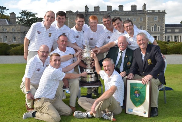 Liam Martin (President, GUI) presenting the AIG Senior Cup to Owen Kavanagh (Team Captain) of the Tramore Senior Cup team after their victory at Carton House today (20/09/2014). Also in the picture (clockwise) are David Kiely, Roger Kennedy (Assistant Team Captain), Rodge Keighery, Niall Kennedy, Ronan Walsh, Robin Dawson, Chris Butler, Paul Flynn, Peter Power, John Mitchell (Captain, Tramore Golf Club) and Alan Thomas. Picture by Pat Cashman