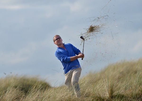 Jonathan O'Driscoll (TCD) playing from the rough at the 12th in the second round of 2014 Irish Colleges Invitational Tournament at County Louth Golf Club today (02/10/2014) Picture by Pat Cashman