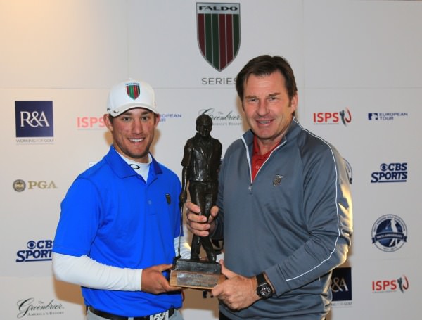 Zachary Bauchou receives the trophy from Nick Faldo. 