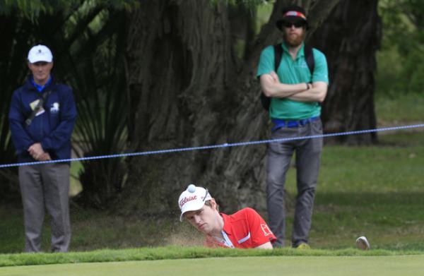Kevin Phelan plays from a bunker on the 13th during round four of the ISPS HANDA Perth International at the Lake Karrinyup Country Club on Sunday 26th October 2014. Picture: Thos Caffrey / www.golffile.ie