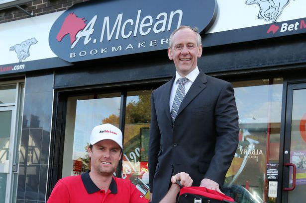 Jonny Caldwell with his new bag sponsor. Picture via Irish Mirror.