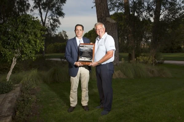 Miguel Vidaor of the European Tour presents Colin MOntgomerie with a silver scroll listing his achievements ahead of his 600th European Tour appearance this week.&nbsp;Credit: Kevin Murray /&nbsp;kevinmurraygolfphotography.com