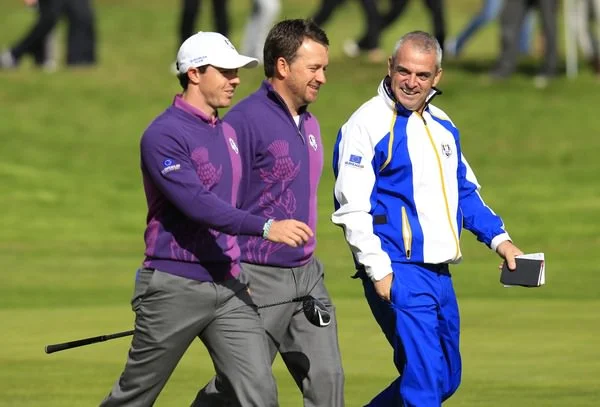 Paul McGinley with his little black book and potential Olympic athletes Rory McIlroy and Graeme McDowell during the Ryder Cup at Gleneagles.&nbsp;Picture Eoin Clarke,&nbsp;www.golffile.ie