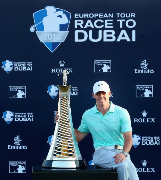 2014 Race to Dubai winner Rory McIlroy with the Harry Vardon Trophy. Picture © Getty Images