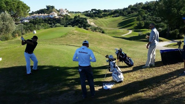 Stephen Grant, watched by winner Tim Gornik, tees off on the 10th in the final round