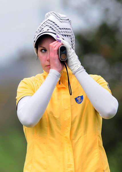 Leinster's Maria Dunne checking distance from the 10th tee during the final day of the Women's Interprovincial Matches at Tramore. 17th April 2014. Picture by Pat Cashman