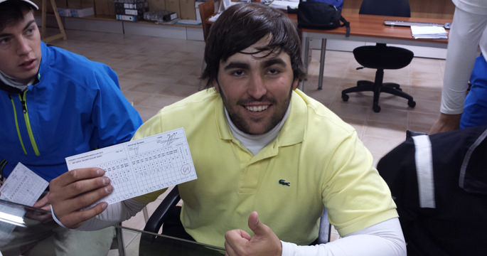 Mario Galiano shows off his card