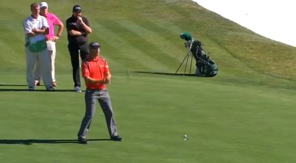 Dermot Desmond and Shane Lowry look on as Pádraig Harrington lips out for birdie on the 18th at Pebble Beach