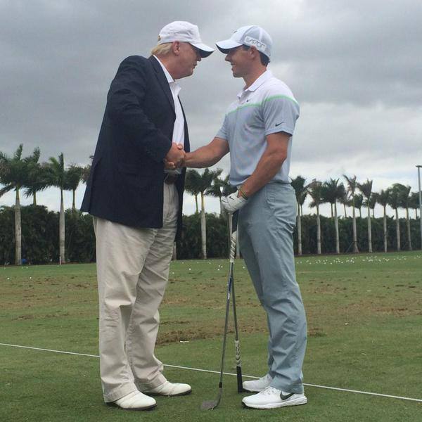 Donald Trump returns Rory McIlroy's three-iron at Doral last week. Picture via Twitter/ @CDW_Jessica