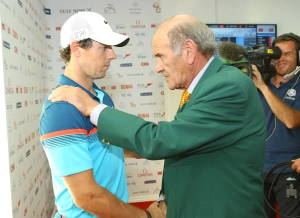Rory McIlroy is congratulated by Dubai Duty Free's Colm McLoughlin on his Dubai Desert Classic win earlier this season