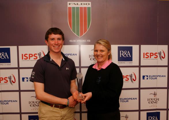 Ted Higgins Jnr receives the Faldo Series Ireland Championship trophy from Lough Erne's PGA professional Lynn McCool in 2014
