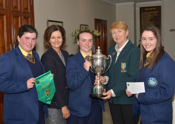 Valerie Hassett presenting Niamh McSherry (St Michael's Grammar School, Lurgan) with the Senior Cup. Also in the picture (from left) Niamh Ward, Niamh McMurrough and Eadaoin Ward. Picture by Pat Cashman