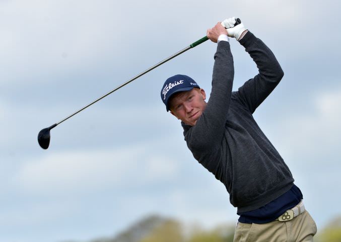 Gavin Moynihan (The Island) driving from the 8th tee in the first round of the 2015 Irish Amateur Open Championship at The Royal Dublin Golf Club. Picture by Pat Cashman