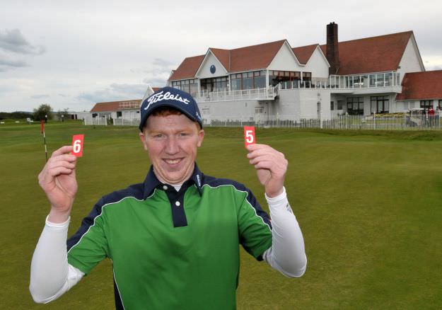 Gavin Moynihan (The Island) after shooting a course record 65 in the third round of the 2015 Irish Amateur Open Championship pctured on the 18th green at The Royal Dublin Golf Club today (09/05/2015). Picture by Pat Cashman