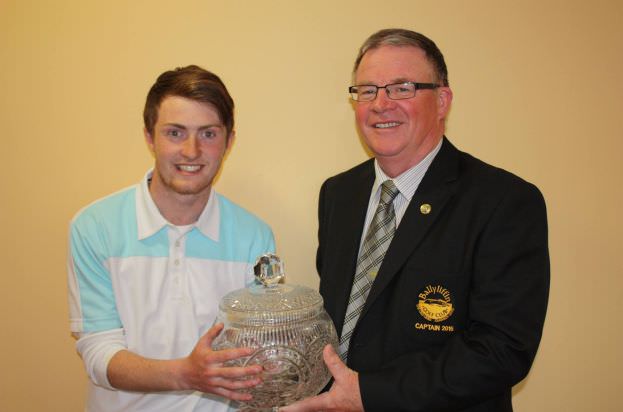 Winner Jamie Foley (Letterkenny GC) receives the Ballyliffin Senior Scratch Cup from Ballyliffin GC Captain Phelim Davenport.