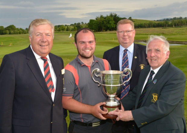 John Ferriter (Chairman, Leinster Golf) presenting Jordan Hood (Galgorm Castle) with the 2015 Leinster Youths Amateur Open Championship trophy after his victory at Charlesland Golf Club today (17/06/2015). Also in the picture are Brendan O'Brien (President, Charlesland Golf Club) and Tony Fitzpatrick (Captain, Charlesland Golf Club). Picture by Pat Cashman