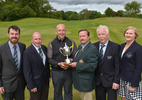Kevin McIntyre (President Elect, GUI) presenting Tony McClements (Hollywood) with the 2015 Irish Mid Amateur Open Championship trophy after his victory at New Forest Golf Club. Also in the picture are (from left) Des Morgan (Golf Director, New Forest Golf Club), Conor McGuinness (Vice Captain, New Forest Golf Club), John Cunningham (President, New Forest Golf Club) and Sherrie E Buckley (Lady Captain, New Forest Golf Club). Picture by Pat Cashman