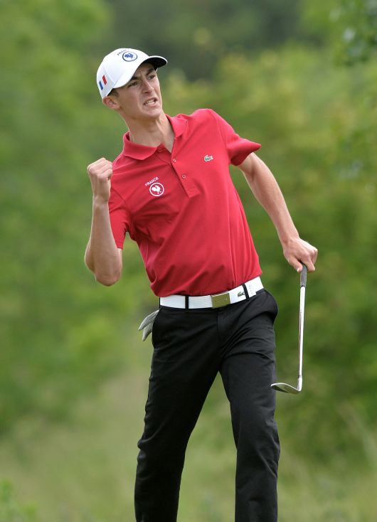 Adrien Pendaries (France) reacts to holing his pitch shot at the 13th green on his way to victory in the 2015 Irish Boys Amateur Open Championship at Tuam Golf Club. Picture by Pat Cashman