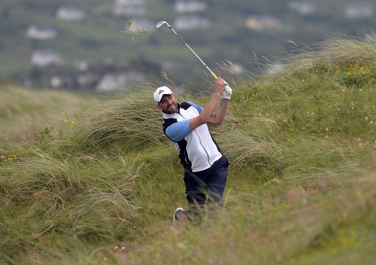 Dave O'Donovan (Munster) playing from the rough at the 14th hole during the second day of the 2015 Interprovincial Championship at Rosapenna Golf Club. Picture by Pat Cashman