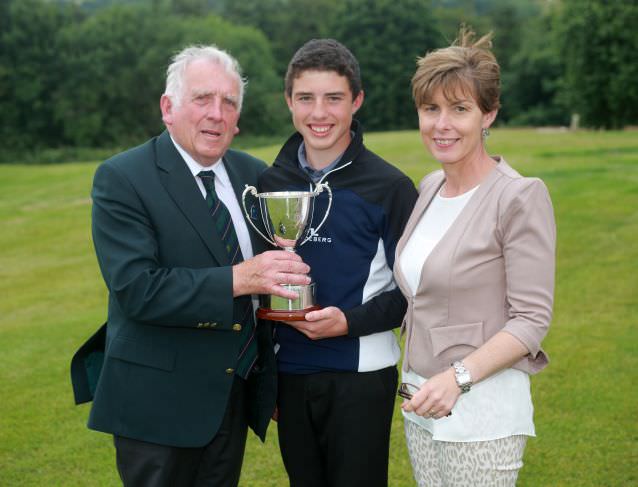 John Ferriter (Leinster Golf) presents Odhrán Maguire and his mother Breda with the Leinster Boys Under 14 Open Championship at Delgany. Picture: Ronan Temple Lang