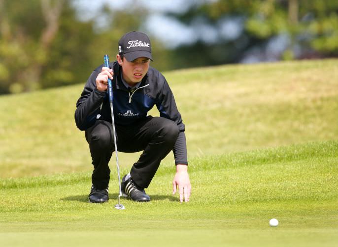 Odhrán Maguire lines up a putt. Picture: Ronan Temple Lang