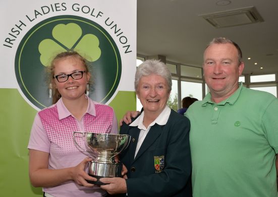 Irene Poynton (Director of Junior Golf, ILGU) presenting Annabel Wilson (Lurgan) with the 2015 Irish Girl's Close Amateur Championship trophy (Blake Cup) after her victory at Galway Bay Golf Club (18/07/2015).Also in the picture is Andy Wilson (Father). Picture by Pat Cashman