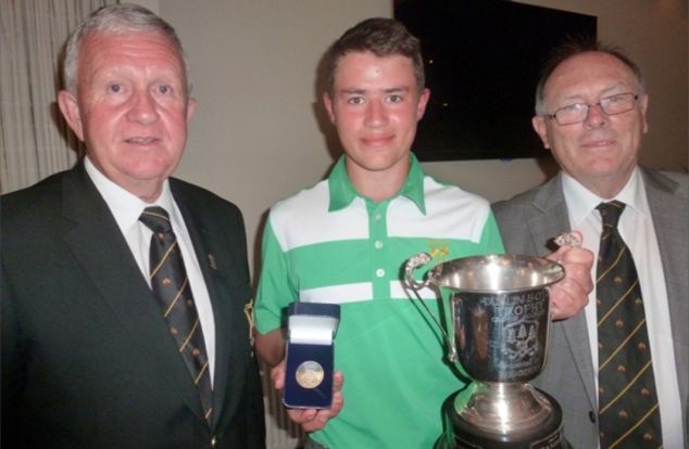 Paul Muldowney, Captain Grange GC (left) presents Charlie Denvir (Powerscourt GC) with the Allianz Grange Dublin Boys Championship trophy. Also pictured, Donal Bollard, Allianz.