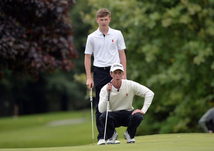 Marc Norton and Marc McKinstry (Ulster) lining up their putt on the 18th green the third day of the Boys Interprovincial Championship matches at Athlone Golf Club. Picture by Pat Cashman