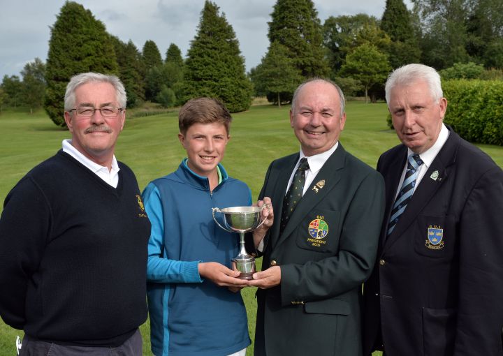 Michael Connaughton (President, Golfing Union of Ireland) presenting Alex Maguire (Laytown & Bettystown) with the 2015 Irish Boys Under 14 Amateur Open Championship trophy after his victory at Roscrea Golf Club today. (30/07/2015). Also in the picture are Noel McMahon (Captain, Roscrea Golf Club) and John Moloughney (Chairman, Munster Branch, GUI).Picture by Pat Cashman