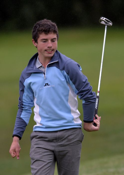 Odhran Maguire (Slieve Russell) reacts to a missed birdie putt on the 16th green in the 2015 Irish Boys Under 14 Amateur Open Championship at Roscrea. Picture by Pat Cashman