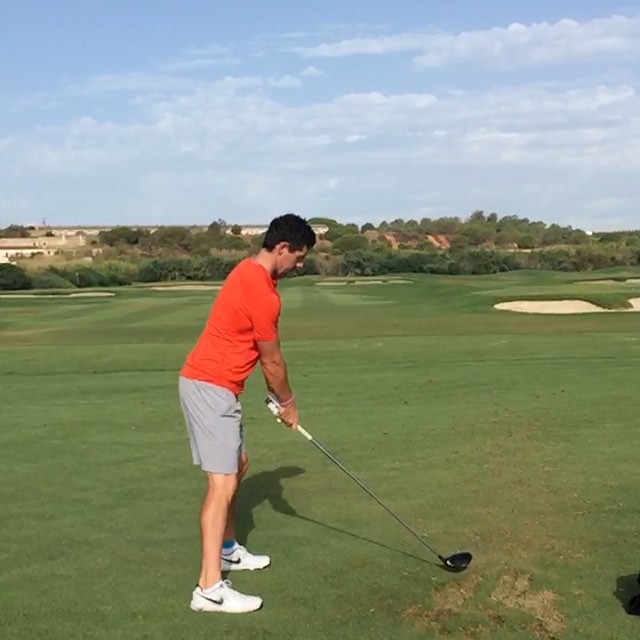 McIlroy hits a driver. Is that strapping on his left ankle?