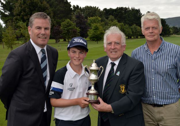 John Ferriter (Chairman, Leinster Golf, GUI) presenting Joshua McCabe (Roganstown) with the 2015 Leinster Boys' Under 13 Series Trophy (sponsored by Titleist) after his victory at the Castle Golf Club (06/08/2015). Also in the picture are John McCormack (General Manager, Castle Golf Club) and Seamus McCabe (Father). Picture by Pat Cashman