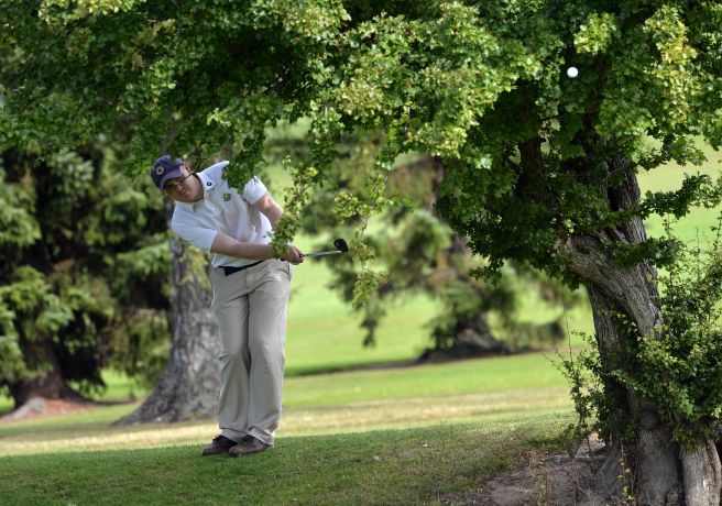 Bryan McSweeney (The Royal Dublin) playing his second shot to the 6th hole in the final round of the 2015 Leinster Mid Amateur Open Championship at Grange. Picture by Pat Cashman
