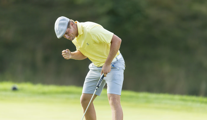 Bryson DeChambeau reacts as he matches Dunne's birdie on the 15th hole during the quarterfinal round of match play of the 2015 U.S. Amateur at Olympia Fields Country Club in Olympia Fields, Ill. on Friday, Aug. 21, 2015. (Copyright USGA/John Mummert)