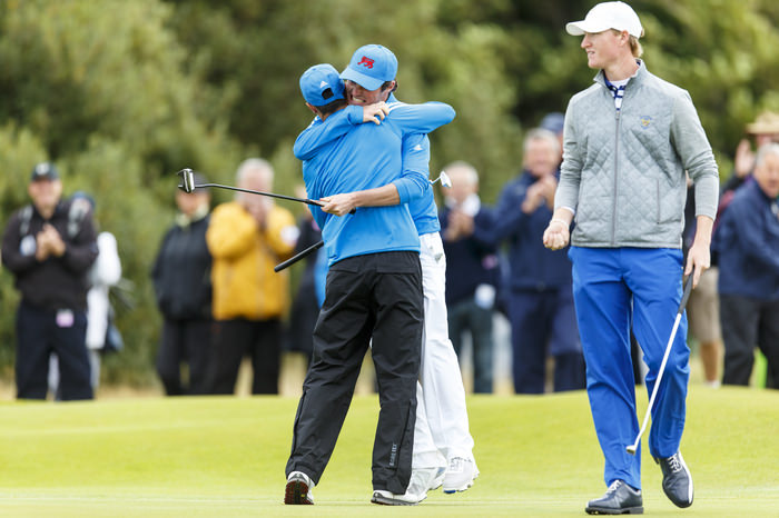 Cormac Sharvin, right, shares a hug with Jack McDonald, left, after they won their match on the 14th hole during the morning foursomes matches of the 2015 Walker Cup at Royal Lytham & St. Annes G.C. in Lytham St Annes, Lancashire on Saturday, Sept. 12, 2015. (Copyright USGA/Chris Keane)