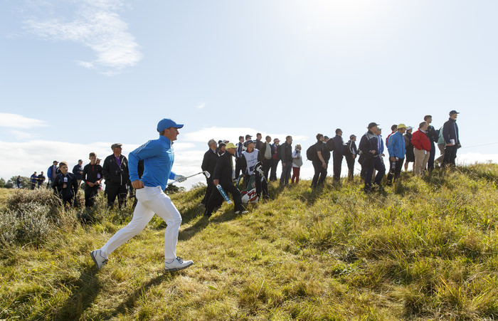 Paul Dunne runs up after playing his third shot on the fourth hole during an afternoon singles match at the 2015 Walker Cup at Royal Lytham & St. Annes G.C. in Lytham St Annes, Lancashire on Saturday, Sept. 12, 2015. (Copyright USGA/John Mummert)