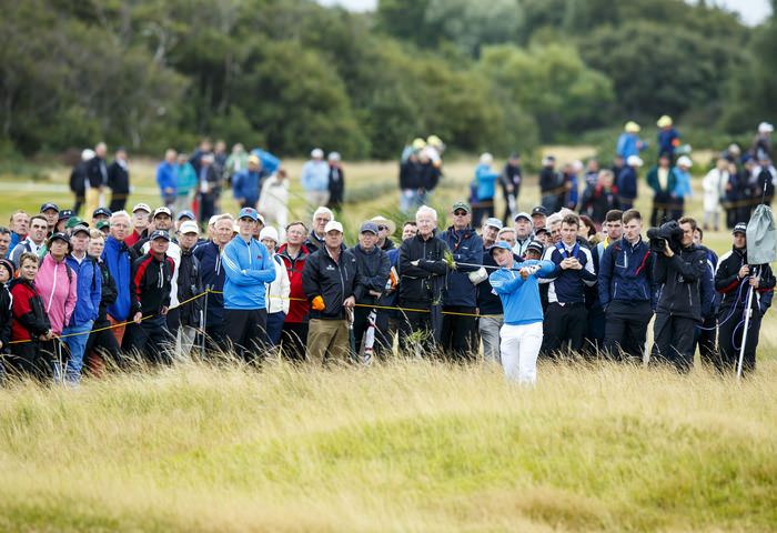 Paul Dunne watches his second shot on the 14th hole during the morning foursomes matches of the 2015 Walker Cup at Royal Lytham & St. Annes G.C. in Lytham St Annes, Lancashire on Saturday, Sept. 12, 2015. (Copyright USGA/John Mummert)
