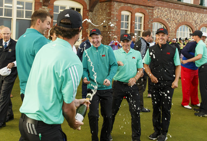 Cormac Sharvin sprays other GB&I players with champagne after winning x during an afternoon singles match at the 2015 Walker Cup at Royal Lytham & St. Annes G.C. in Lytham St Annes, Lancashire on Sunday, Sept. 13, 2015. (Copyright USGA/John Mummert)