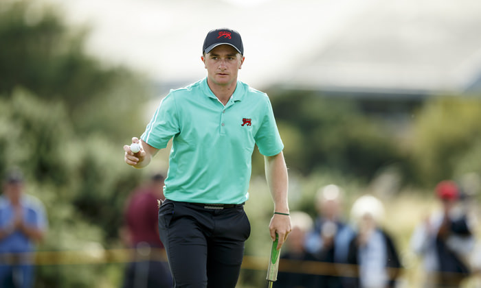 Paul Dunne waves after his putt on the 11th hole during an afternoon singles match at the 2015 Walker Cup at Royal Lytham & St. Annes G.C. in Lytham St Annes, Lancashire on Sunday, Sept. 13, 2015. (Copyright USGA/John Mummert)
