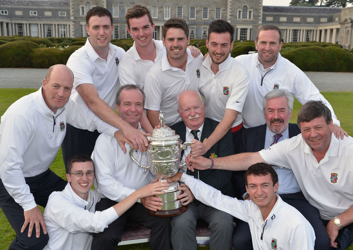 Castletroy member Liam Martin (President, Golfing Union of Ireland) presenting the AIG Junior Cup to John McDonnell (Team Captain) after Castletroy's victory at Carton House in 2014. Also in the picture are (clockwise) Keith Bermigham, Michael Murphy, Colm Geary, David Charlton, Brendan Reidy, John Kavanagh, Cillian O'Muineachain, Diarmuid Leonard, Simon Russell (AIG) and Jonathan McDonnell. Picture by Pat Cashman