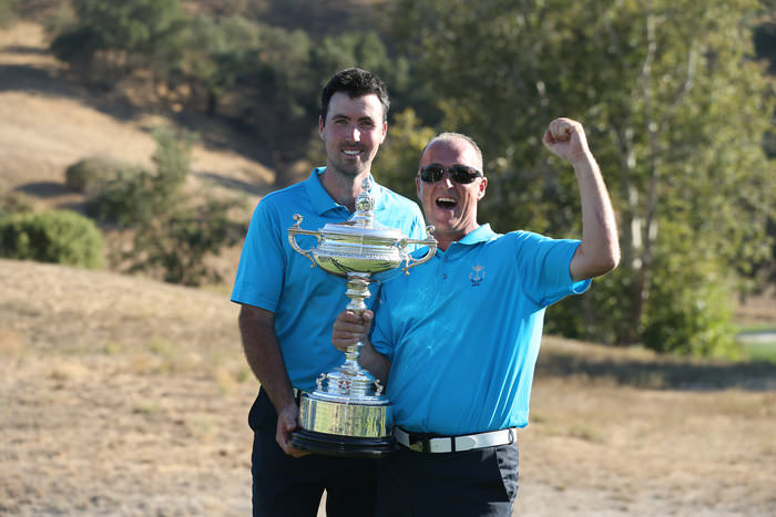 Niall Kearney with Great Britain & Ireland PGA Cup captain Jon Bevan. Picture courtesy Scott Halleran and Getty Images.