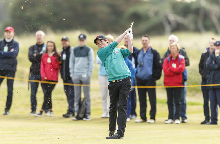 Cormac Sharvin watches his second shot on the fourth hole during a morning foursomes match at the 2015 Walker Cup at Royal Lytham & St. Annes G.C. in Lytham St Annes, Lancashire on Sunday, Sept. 13, 2015. (Copyright USGA/Chris Keane)