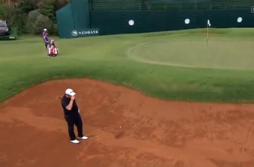 Shane Lowry laments his first bunker shot at the 18th