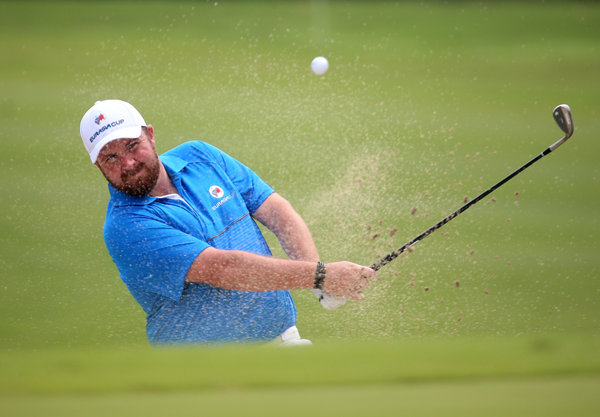 Shane Lowry of Ireland plays out of a bunker on the 16th in the 2016 EurAsia Cup presented by DRB-HICOM at Glenmarie Golf and Country Club. Picture: Mark Dadswell/Asian Tour