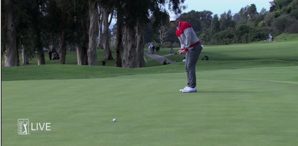 Rory McIlroy shaves the holes with a 20 footer for birdie at the 18th, his ninth