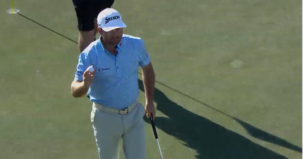 McDowell celebrates his birdie at the 17th