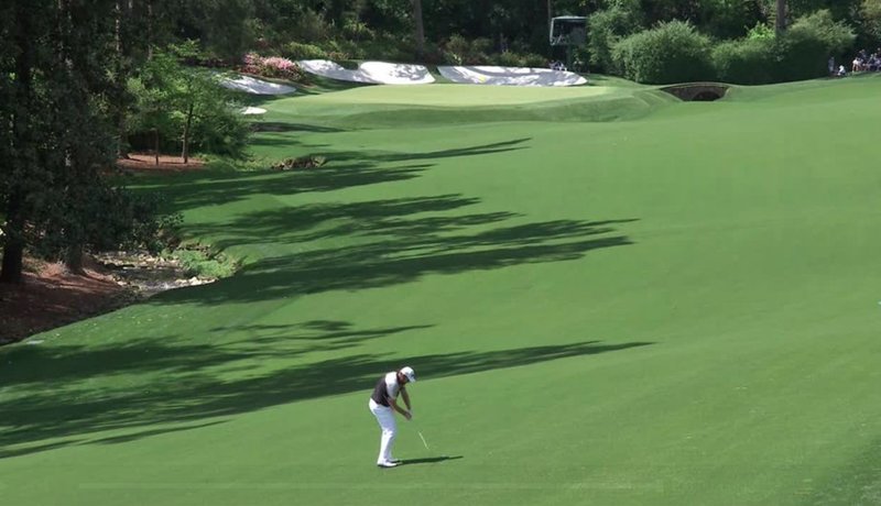 Shane Lowry hits his second to the 13th