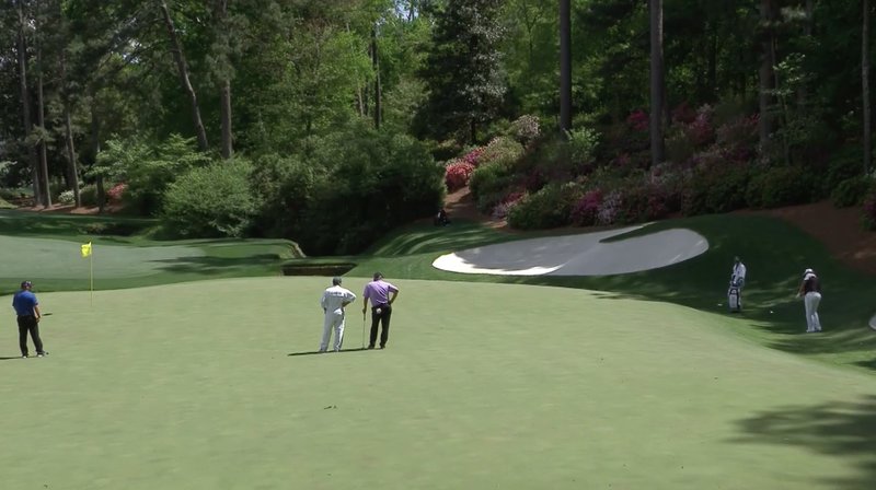 Shane Lowry chips dead at the 13th to set up a birdie four