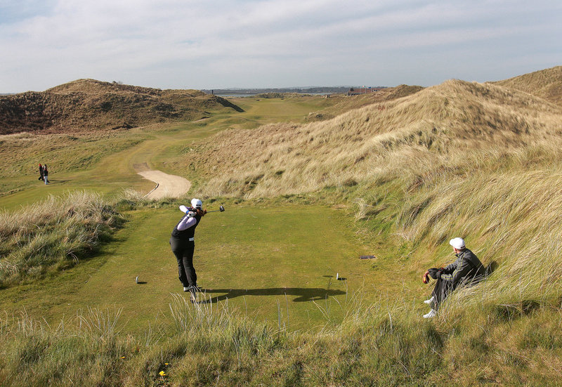 Irish Womens Open Strokeplay chamion Olivia Mehaffey (Royal Co Down)watches her tee shot on the 18th with caddie Kevin Le Blanc at the Island Golf club