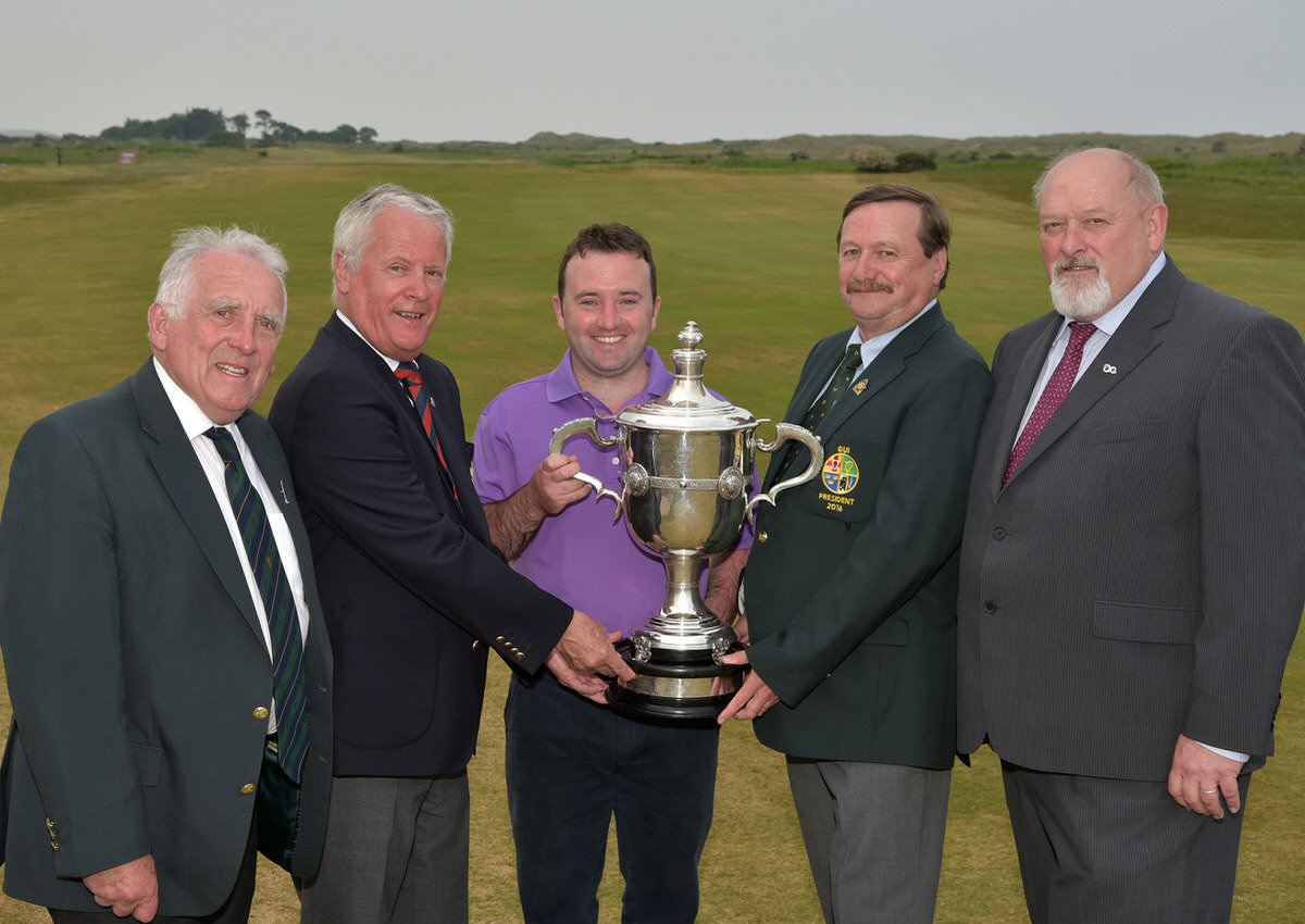 Kevin McIntyre (President, Golfing Union of Ireland) presenting Paul O'Hanlon (Carton House) with the City North Hotel sponsored East of Ireland Championship trophy. Also in the picture (from left) John Ferriter (Chairman, Leinster Golf, GUI), Frank Gannon (Captain, Co Louth Golf Club) and Peter Byrne (City North Hotel). Picture by Pat Cashman